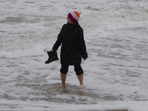 Anne paddling in the sea in Dorset on New Year's Day